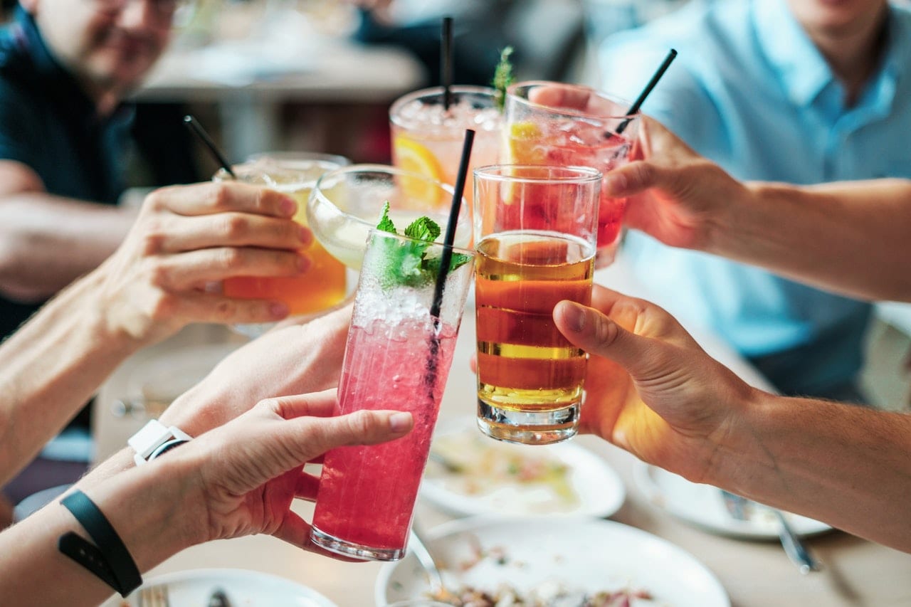 Friends Cheers Drinking Kombucha